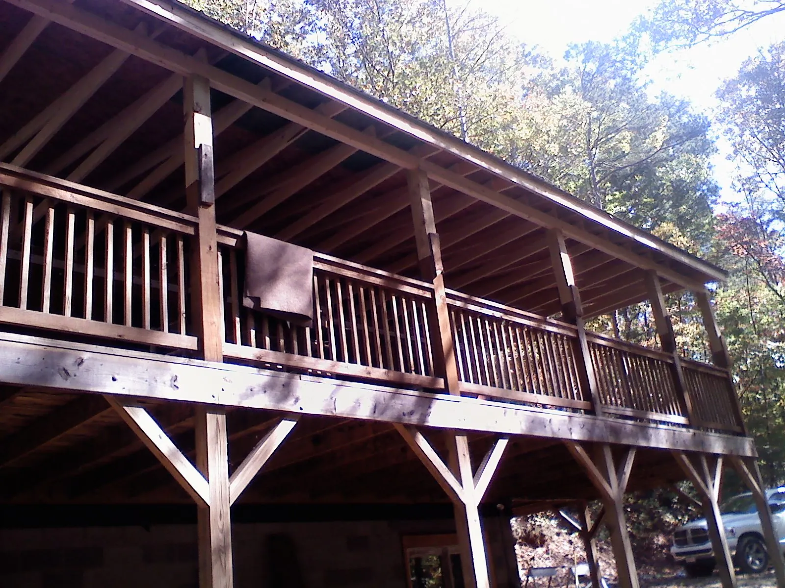 Timber framing under a new elevated porch and deck — Roof Leak Repair in Westley by Roofing Brothers